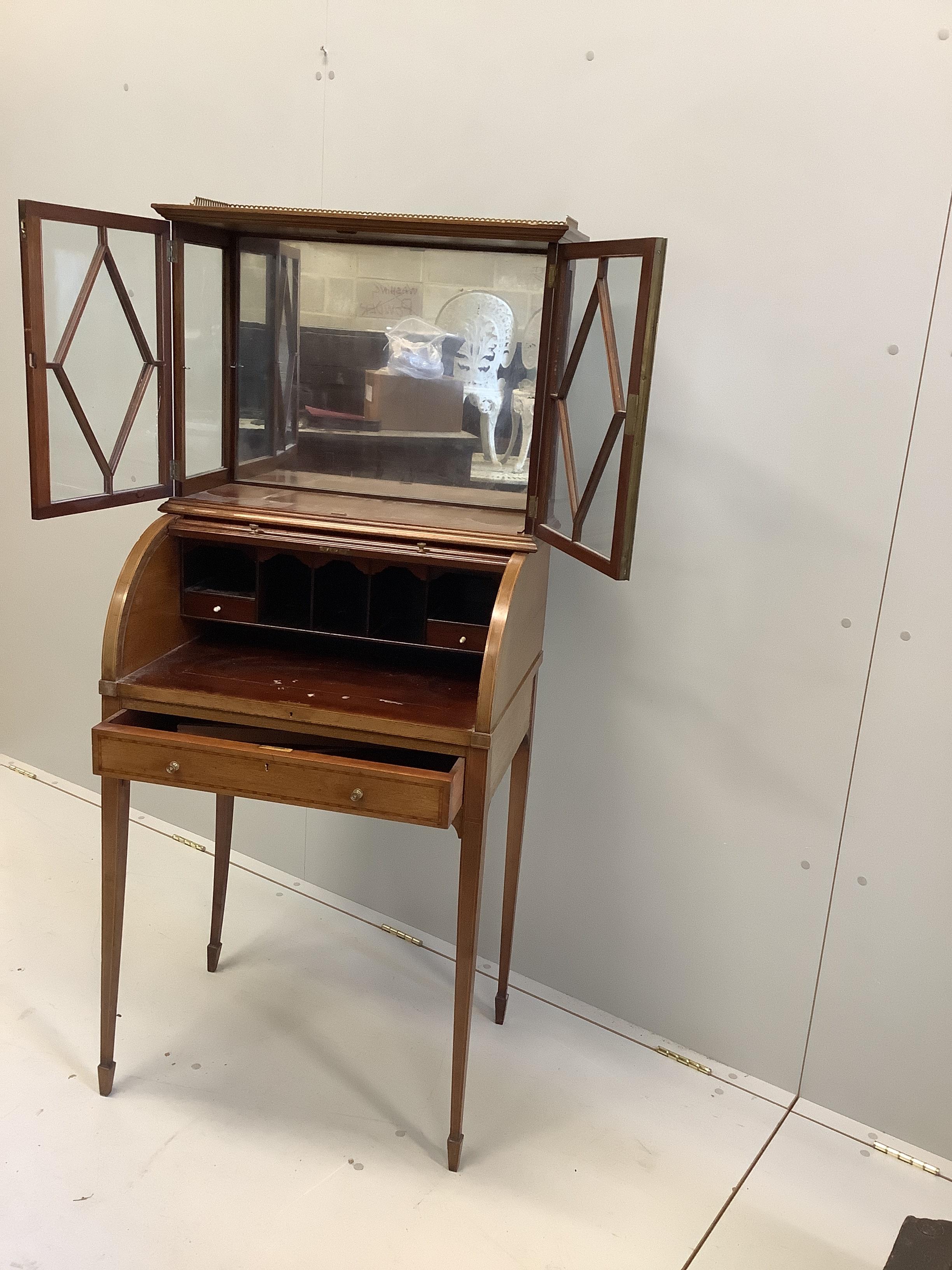 A small Edwardian satinwood banded mahogany cylinder bureau bookcase, width 64cm, depth 47cm, height 151cm